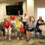 Group of older adults playing Summer Games Event at Lakewood Senior Living