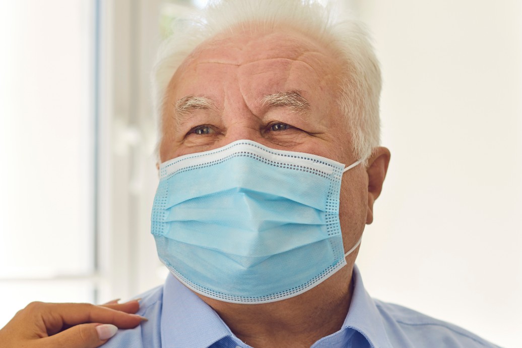 Senior man wearing a mask