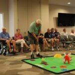 mini golf summer games event at Lakewood Senior Living