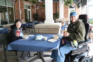 Senior couple enjoying lunch at Earth Day Celebration Lakewood Senior Living