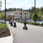 Lakewood Senior Living residents riding on Segway courtesy of RVA on Wheels.