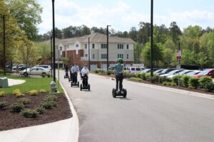 Lakewood Senior Living residents riding on Segway courtesy of RVA on Wheels.