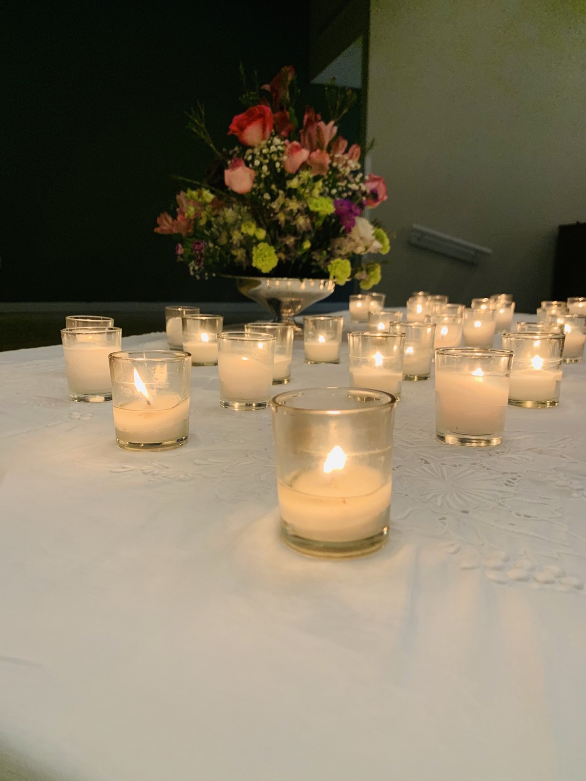 Lakewood Hosts an event of Remembrance with a table of candles on the table