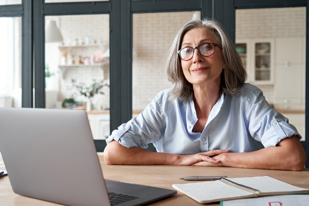 Senior woman working from home