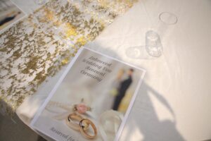 Close up on arrangements on a guest table during resident wedding renewals