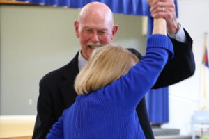 A senior couple dance after their vow renewal.