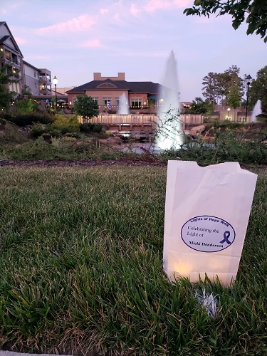 Light of Hope bag in front of fountain