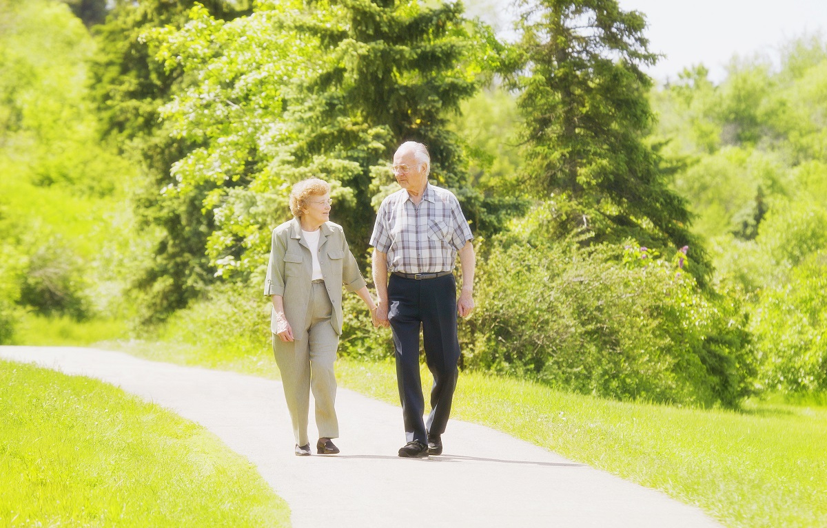 elderly couple taking a walk