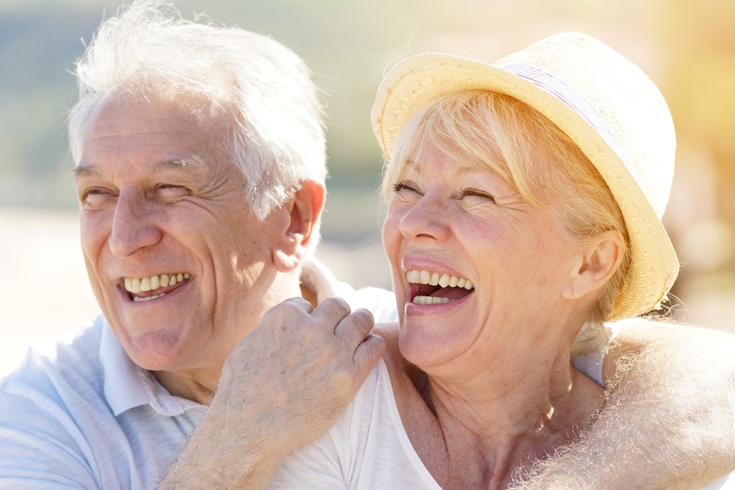 senior couple enjoying their independence at the beach