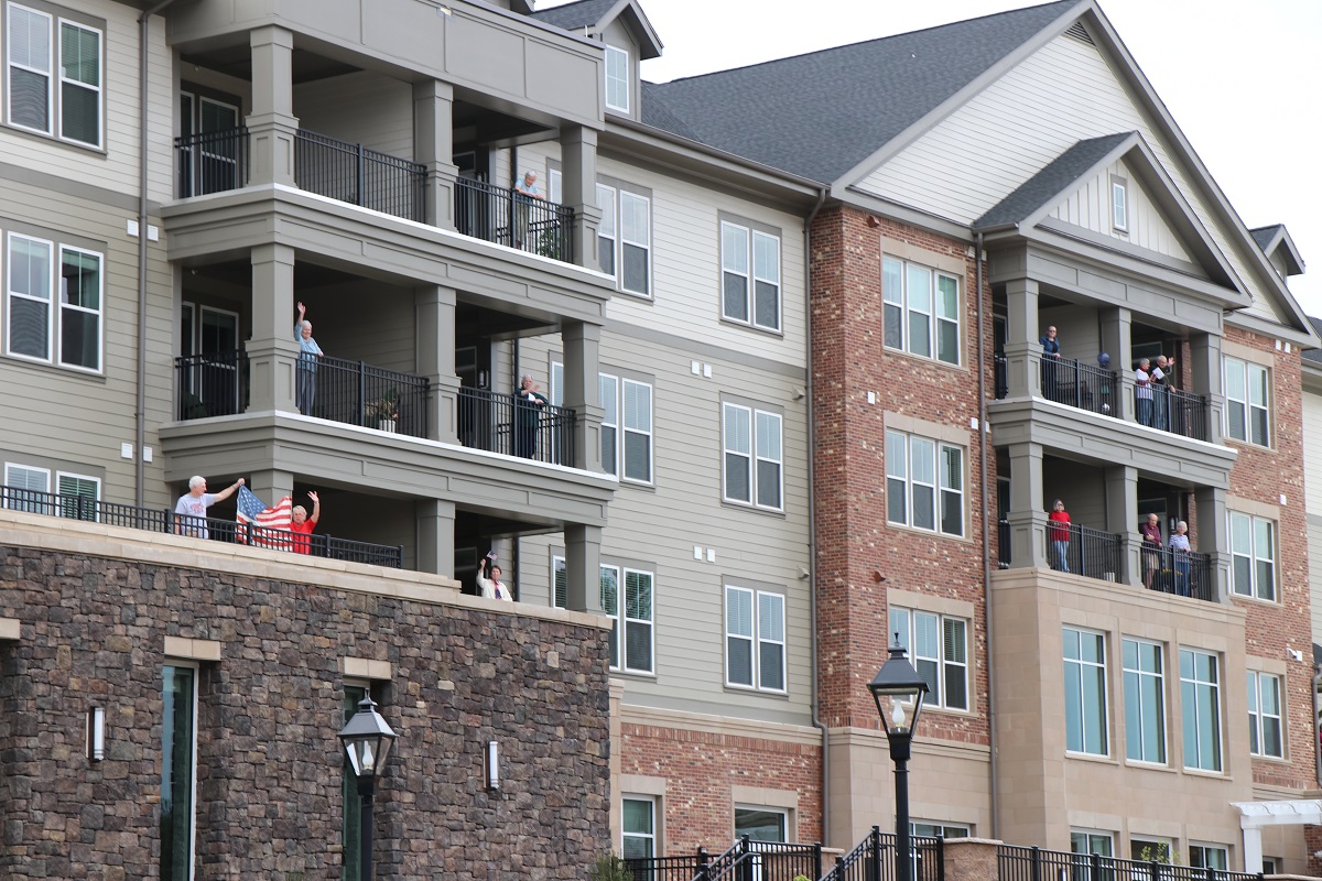 huge view of residents standing outside at Lakewood